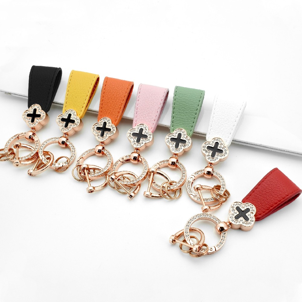 Wholesale four-leaf clover zinc alloy metal leather keychain holder for women girls charm